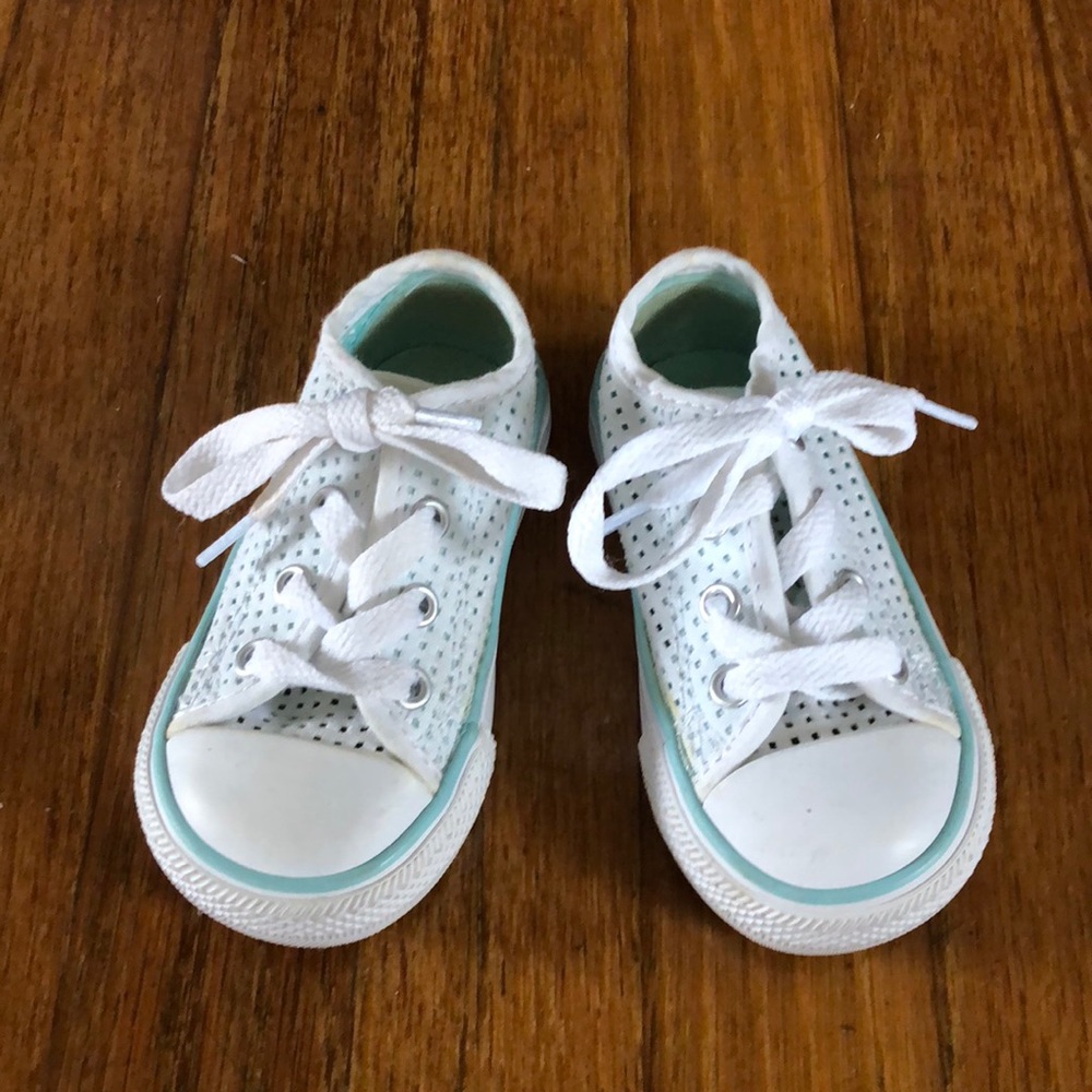 White Converse with teal trimming